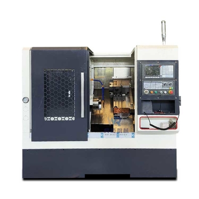 La machine à tourner CNC horizontale multifonctionnelle TCK40 avec fente à broche de 52 mm et puissance W 7.5kw