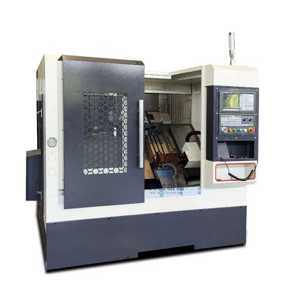 La machine à tourner CNC horizontale multifonctionnelle TCK40 avec fente à broche de 52 mm et puissance W 7.5kw